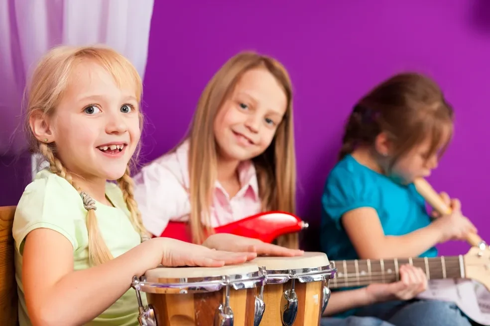 Children enjoying playing instruments together